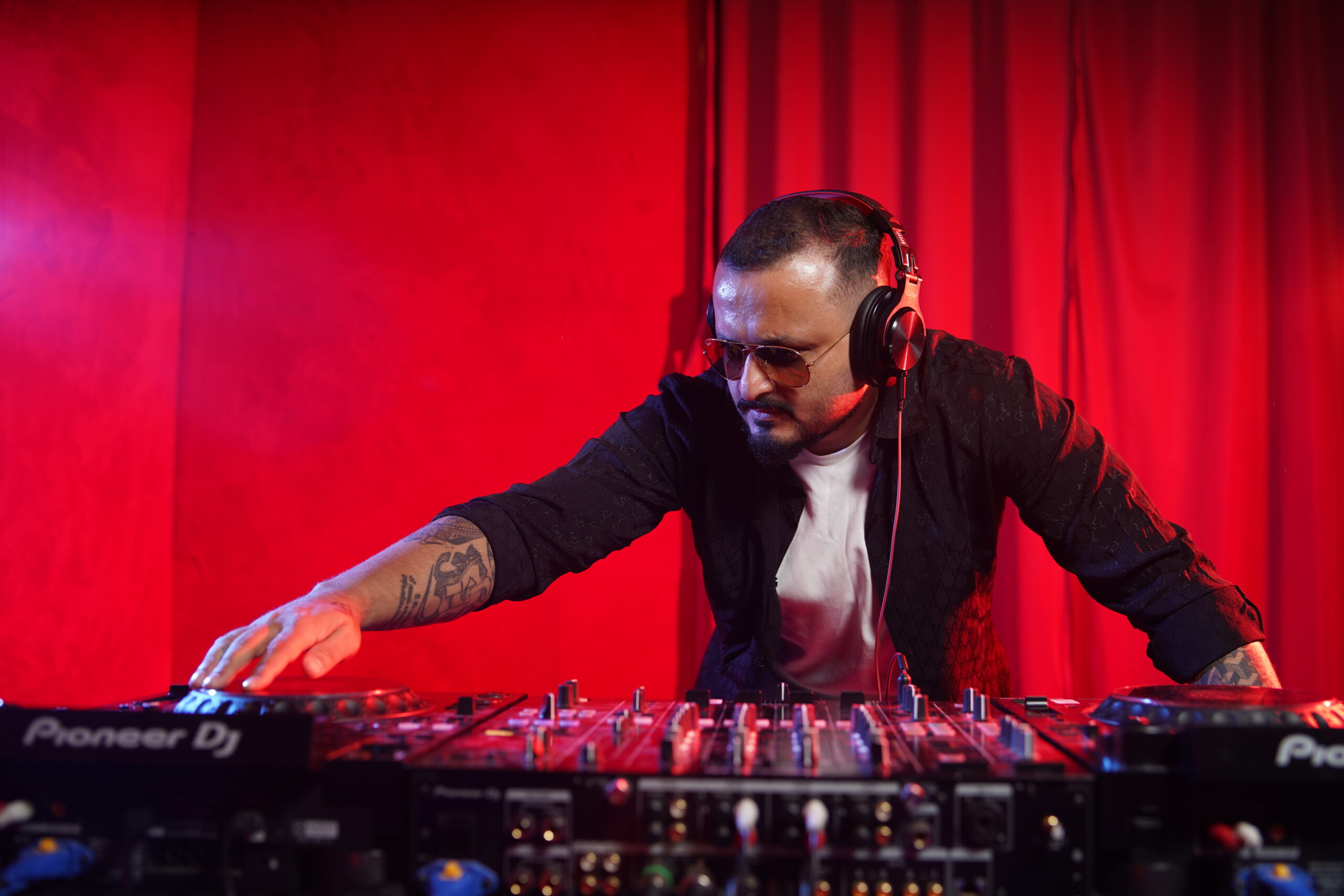 Dramatic dark portrait of DJ Taurx